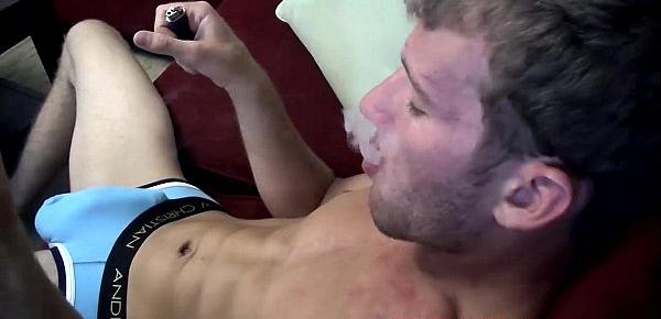  Sexy and cute Jake Parker smoking a cigar and stroking dick